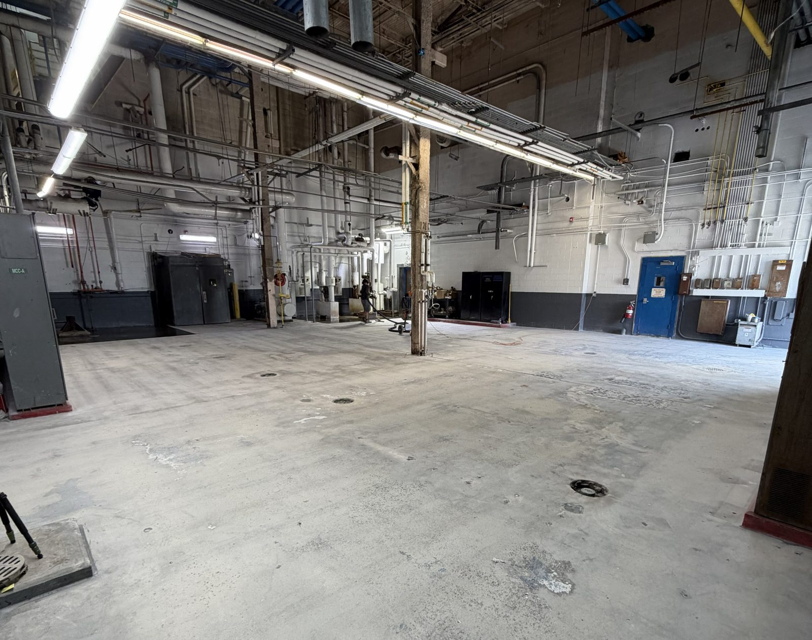 Concrete floor surface preparation and grinding at an industrial facility